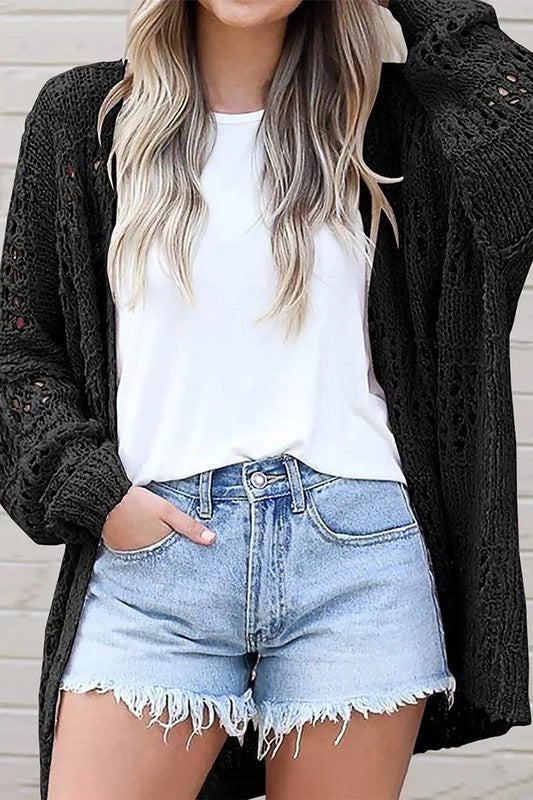 Shophouse Northwest black crochet dolman sleeve cardigan open front over white tee and denim shorts