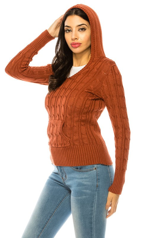 Shophouse Northwest rust cable knit hoodie sweater plus size with front pocket modeled by woman in jeans