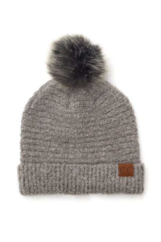 Shophouse Northwest grey ribbed knit cuffed beanie with dark faux pom and leather patch ultra soft fur pom beanie
