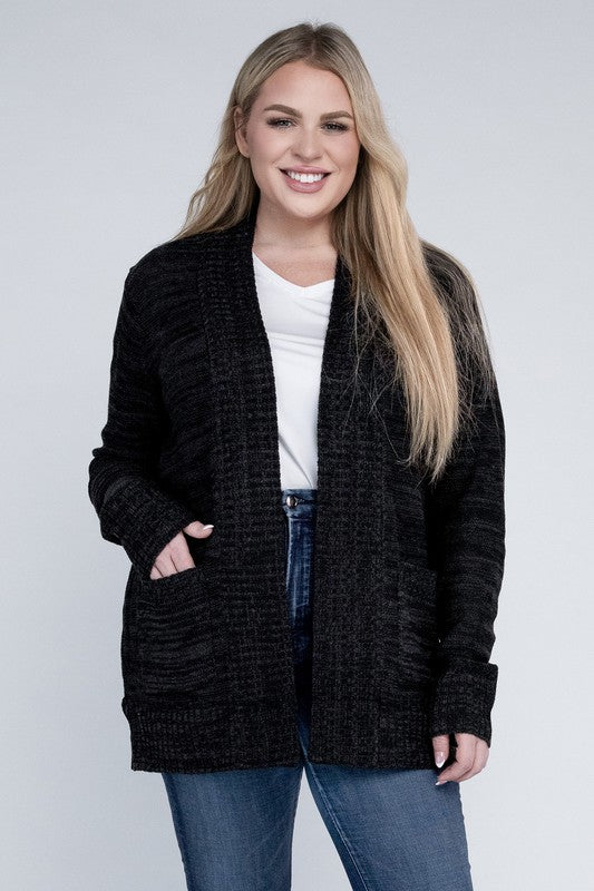 Shophouse Northwest plus size open front cardigan in black knit with pockets worn over white tee and jeans