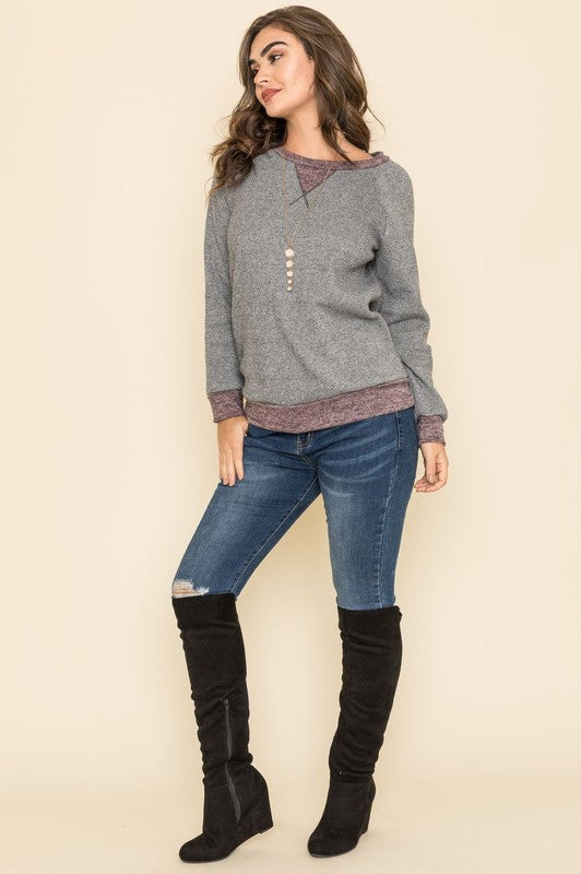 Shophouse Northwest plus size raglan tunic sweater gray heather with layered hem modeled with jeans and black over the knee boots