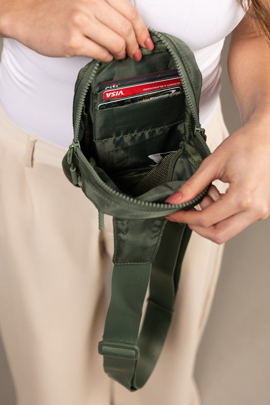 Shophouse Northwest olive green nylon crossbody bag for women open to show card slots and adjustable strap