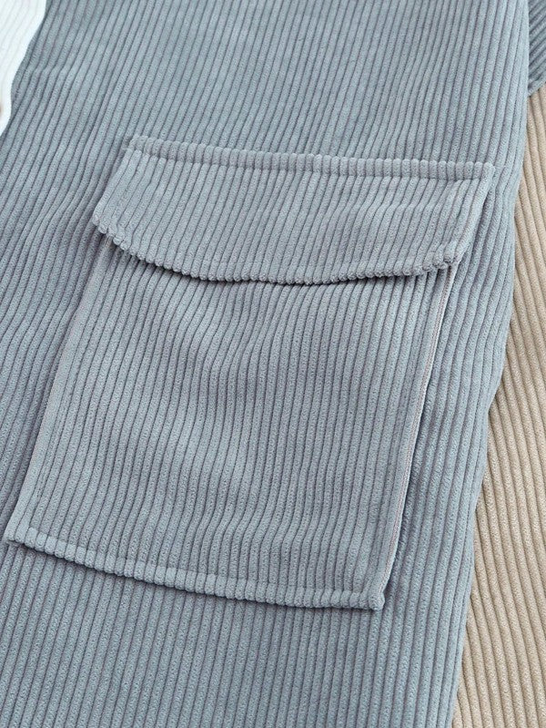 Shophouse Northwest corduroy boho patch shirt shacket close up of light blue ribbed corduroy flap pocket detail