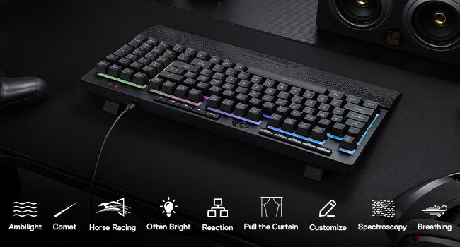 Redragon K515 Shiva gaming keyboard with RGB lighting and sleek black design on a dark desk setup