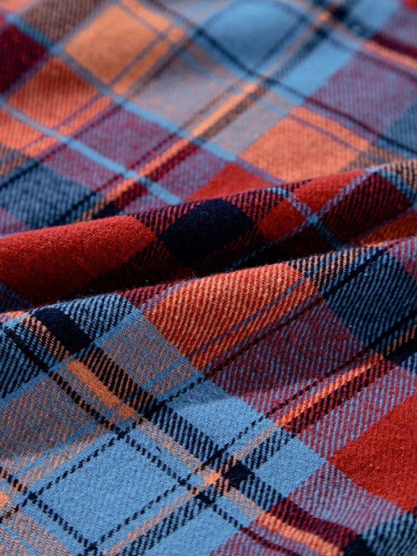 Shophouse Northwest cotton boho plaid shacket close up of red blue orange plaid fabric with soft brushed texture