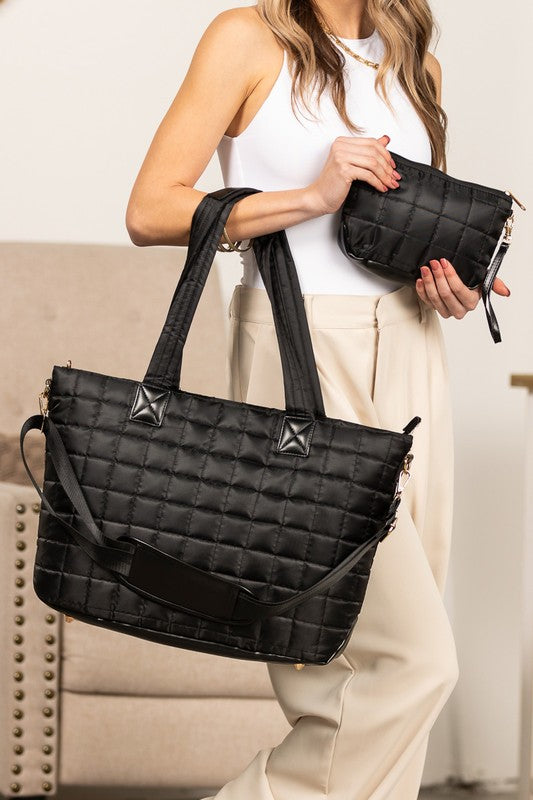 Shophouse Northwest black quilted travel tote bag with matching quilted pouch shoulder straps and detachable strap
