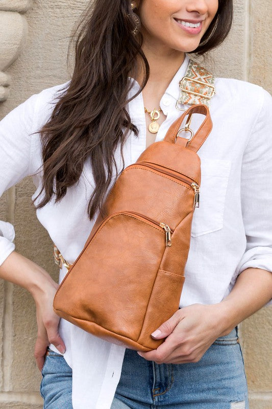 Shophouse Northwest tan leather everyday sling bag for women with adjustable strap and zip pockets
