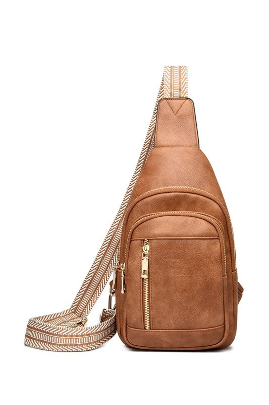 Genevive leather sling crossbody bag tan brown with chevron strap gold zippers front pocket for travel