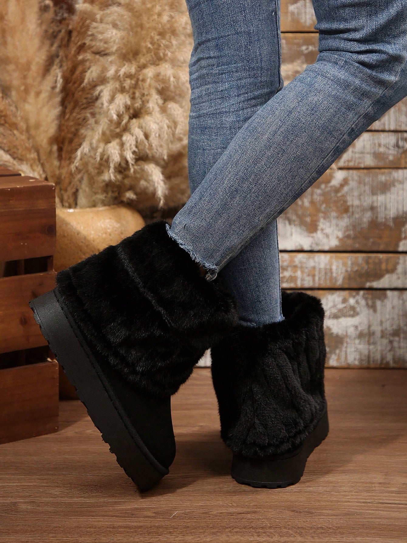 Cozy black winter warm boots for women with plush lining, ideal for cold weather and casual outings