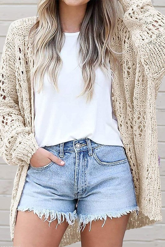 Shophouse Northwest crochet dolman sleeve cardigan in cream open knit over white tee and denim shorts
