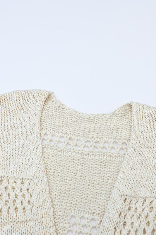 Shophouse Northwest cream crochet dolman cardigan with open lace stitch and scoop neckline closeup