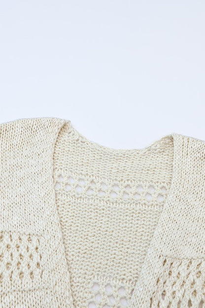 Shophouse Northwest cream crochet dolman cardigan with open lace stitch and scoop neckline closeup
