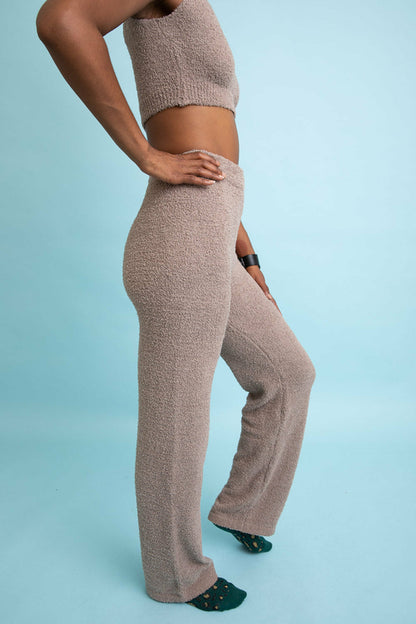 Comfortable boucle lounge pants in beige, ideal for relaxing at home with a stylish fit