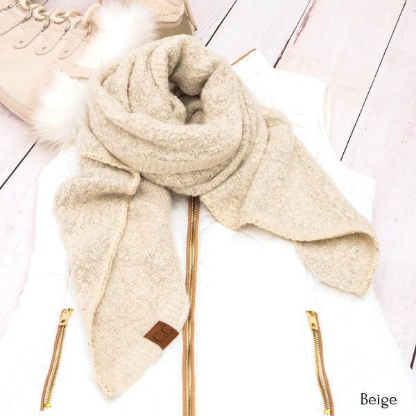 Beige wool blend scarf by Shophouse Northwest styled on white jacket with boots cc cozy draped oversized scarves for women