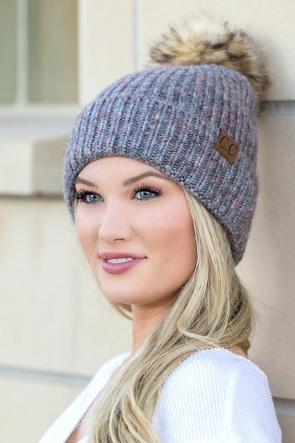 Shophouse Northwest CC marled pom beanie gray marled knit with faux fur pom and leather CC patch on model