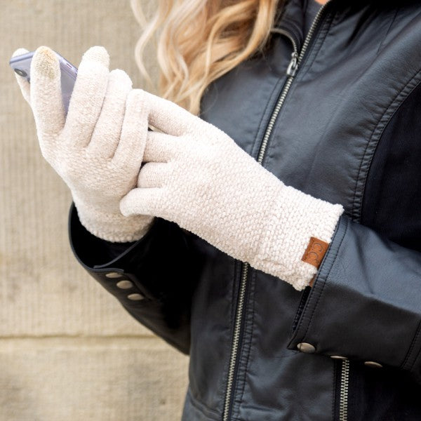 Shophouse Northwest chenille touch screen gloves in cream being used to operate smartphone by woman