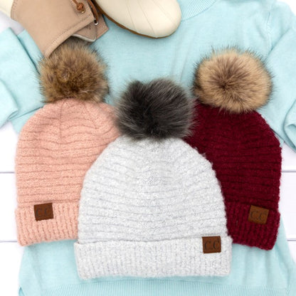 Shophouse Northwest ultra soft fur pom beanie trio in pink gray and burgundy knit with leather logo tags