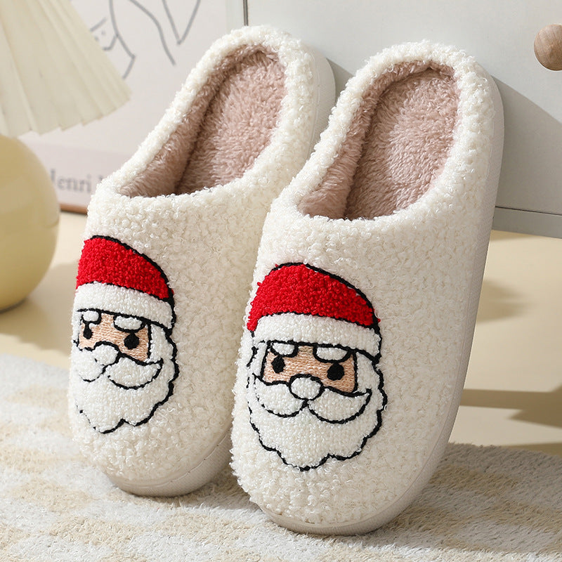 Cozy Christmas cartoon slippers featuring a festive Santa design for holiday comfort