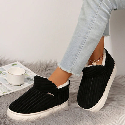 Jumpstudios-BTG cozy indoor house slippers in black with plush lining for ultimate comfort