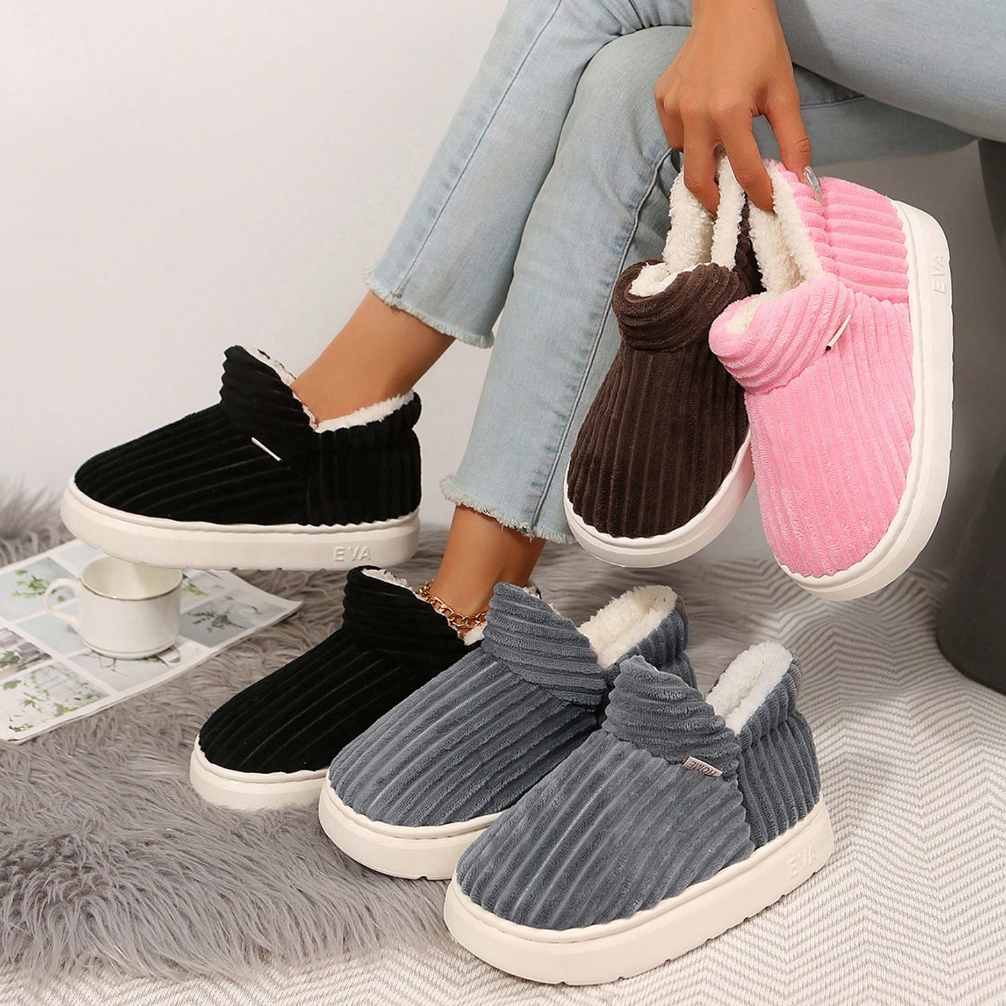 Cozy indoor house slippers in pink, black, and gray with soft lining for ultimate comfort at home