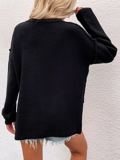 Shophouse Northwest black women's long sleeve loose sweater knit oversized back view with denim shorts