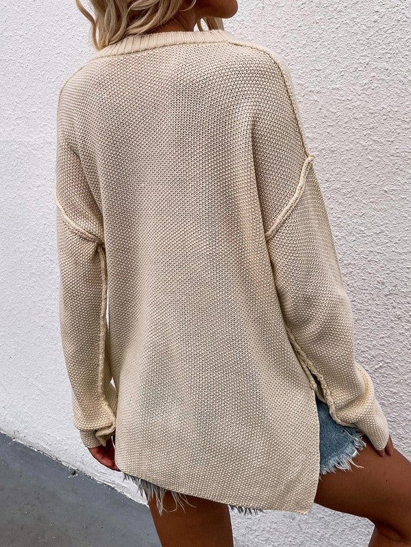 Shophouse Northwest beige knit women's long sleeve loose sweater back view on model