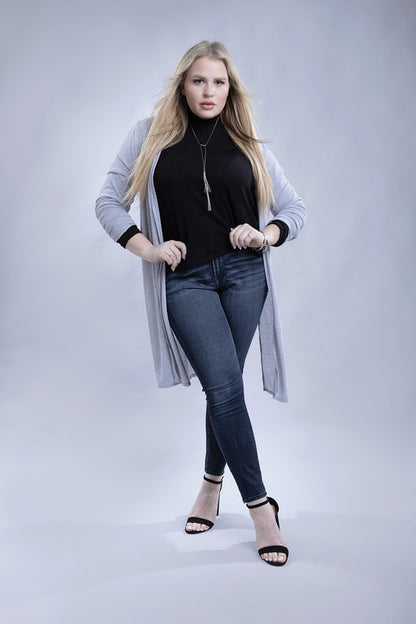 Shophouse Northwest plus size everyday comfy cardigan in light gray worn over black top with jeans