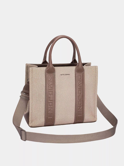 David Jones canvas tote bag featuring durable material and adjustable strap for stylish versatility