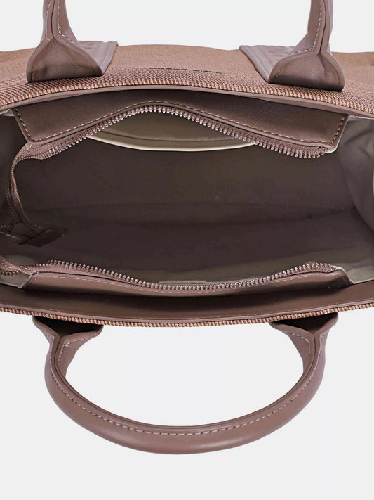 Inside view of the David Jones canvas tote bag showing spacious compartments and zipper closure