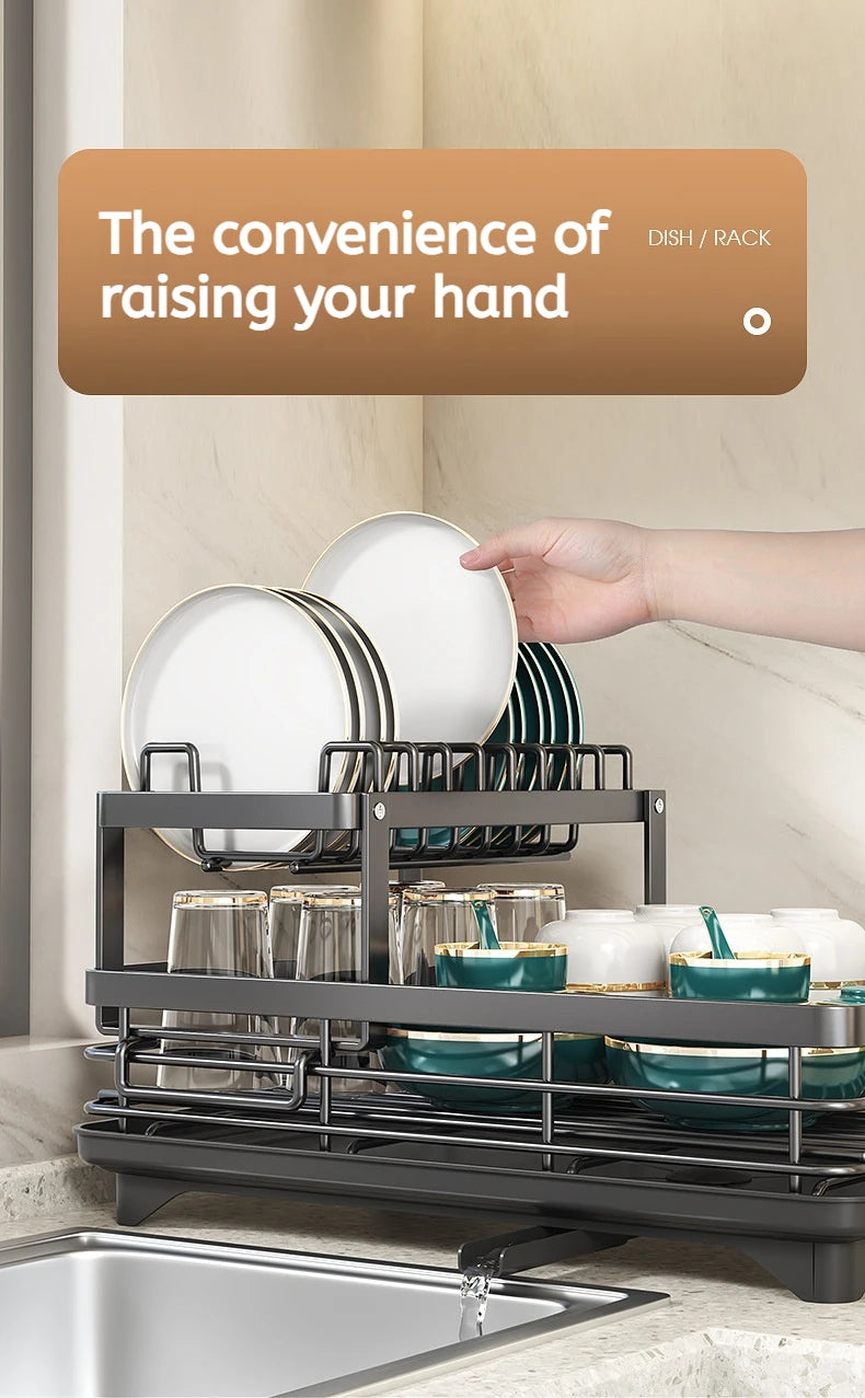Double layer kitchen drying rack holding plates and glasses, ideal for efficient dish drying