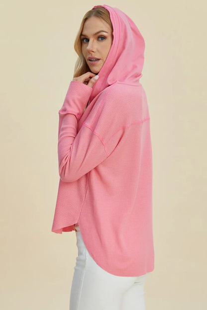 Trendsi dropped shoulder high-low hoodie in pink offering a trendy and comfortable fit.