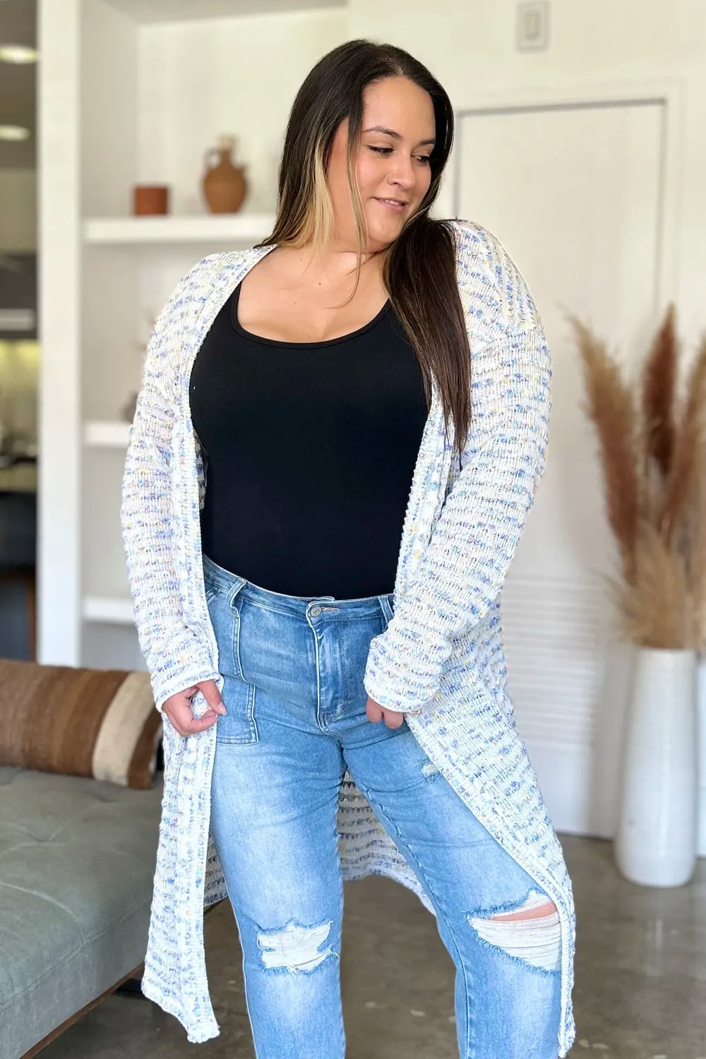 Trendsi full size cardigan sweater in light colors paired with casual jeans for a cozy look