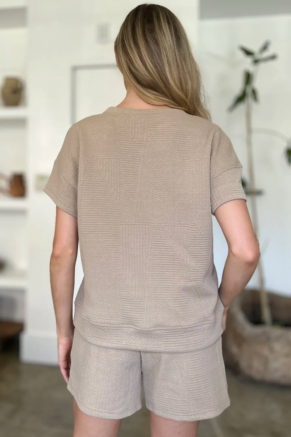 Back view of a beige full size textured short set perfect for casual summer outings