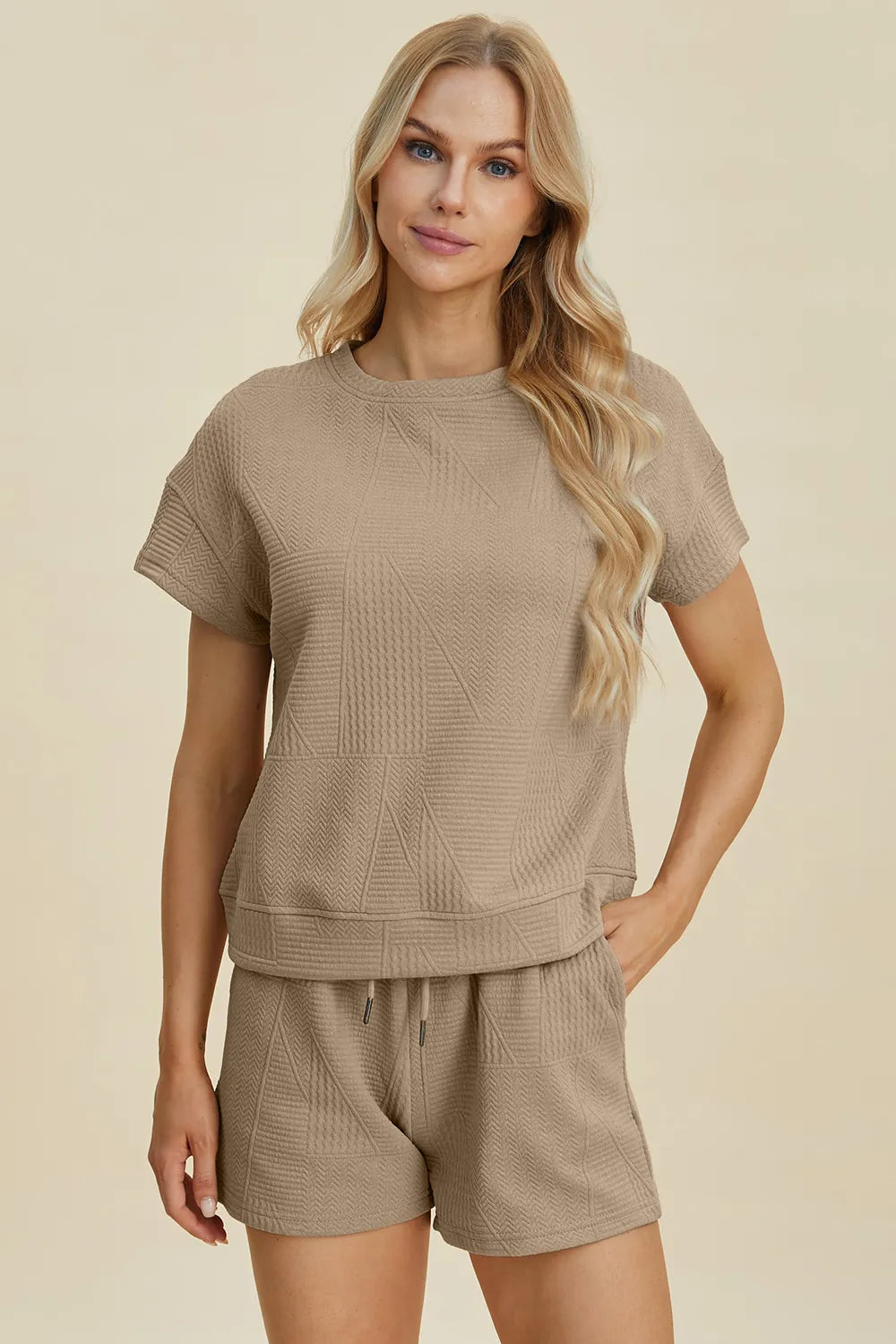 Trendsi full size textured short set in beige featuring a relaxed fit top and matching shorts