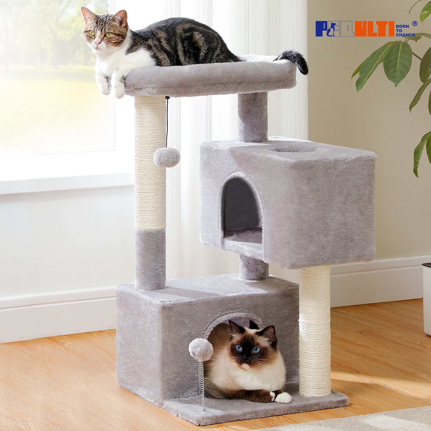 Large cat tree for indoor cats featuring platforms, scratching posts, and a cozy hideaway