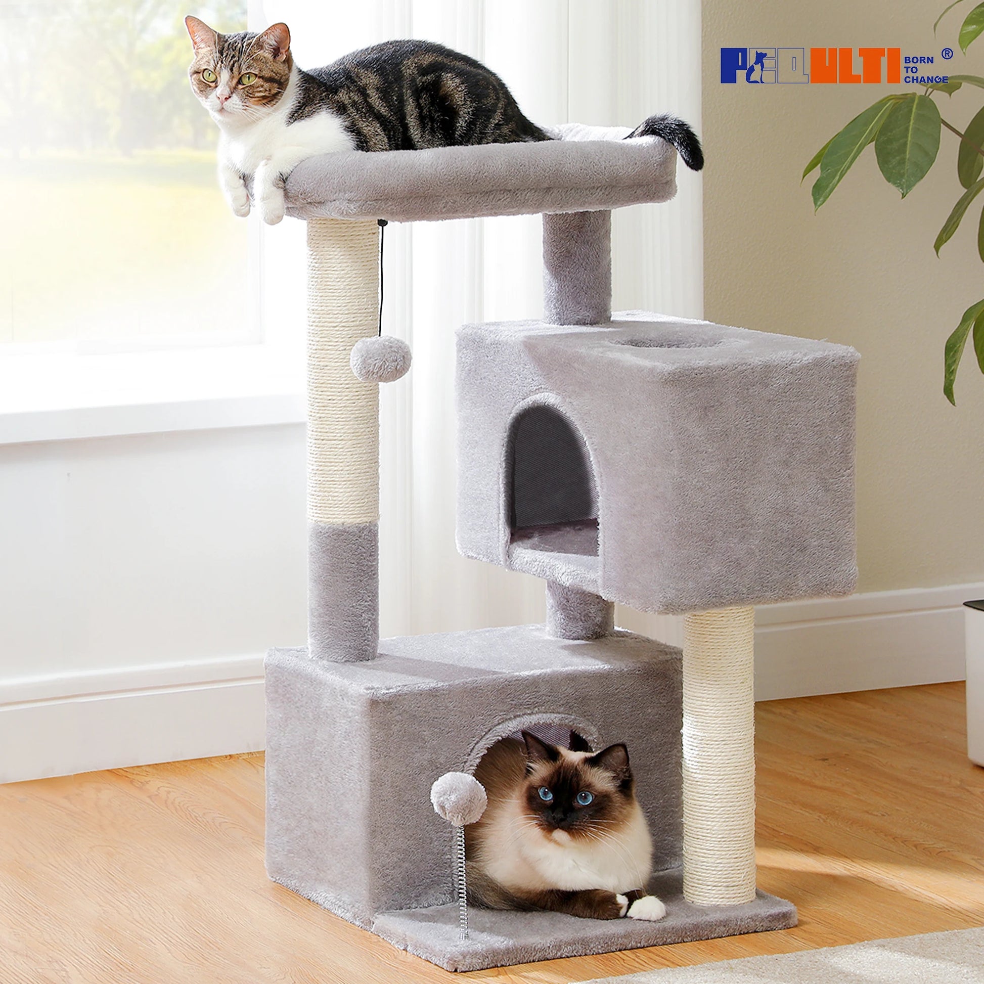 Large cat tree for indoor cats featuring platforms, scratching posts, and a cozy hideaway