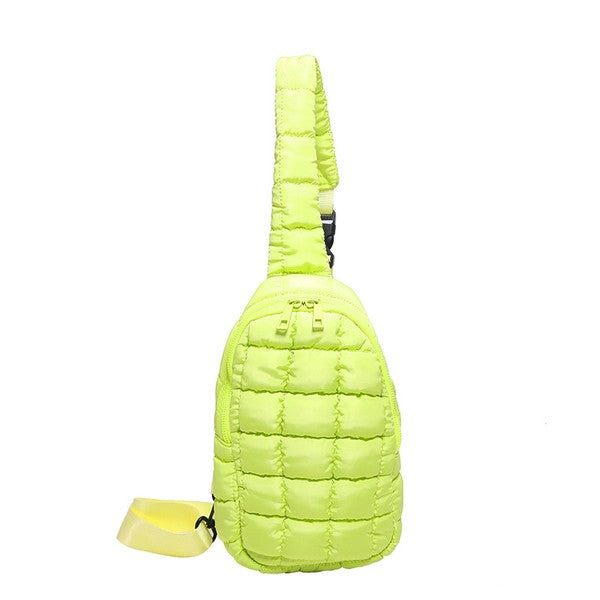 Skyler puffer sling bag by Shophouse Northwest neon yellow quilted crossbody with adjustable strap and zip closure