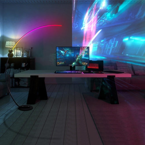 Modern curve floor lamp illuminating a stylish workspace with vibrant colors and a sleek design