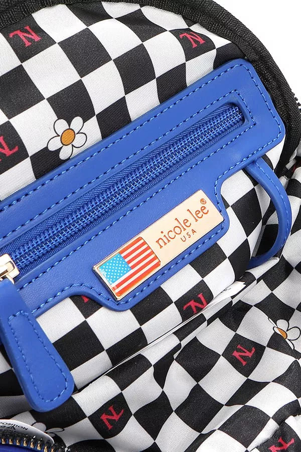 Interior of Nicole Lee color patch bag featuring a blue zipper and a stylish checkerboard pattern