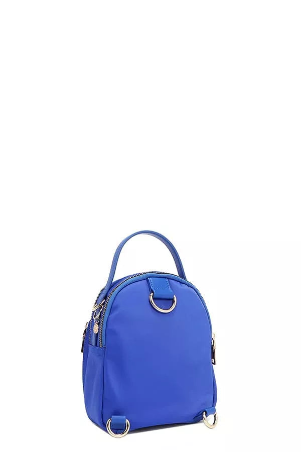 Nicole Lee color patch bag in vibrant blue with a stylish design and convenient handle
