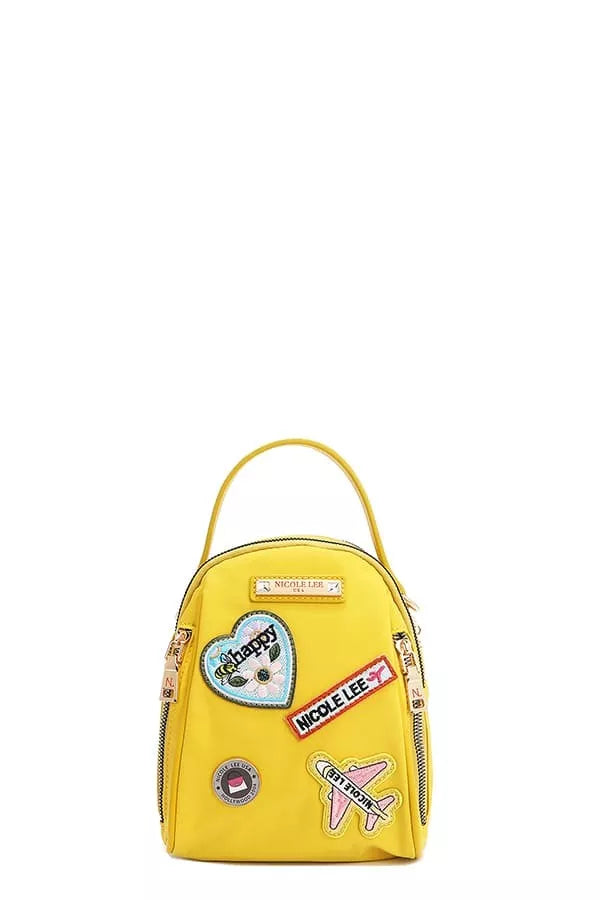 Nicole Lee color patch bag in yellow with colorful patches and zippered compartments