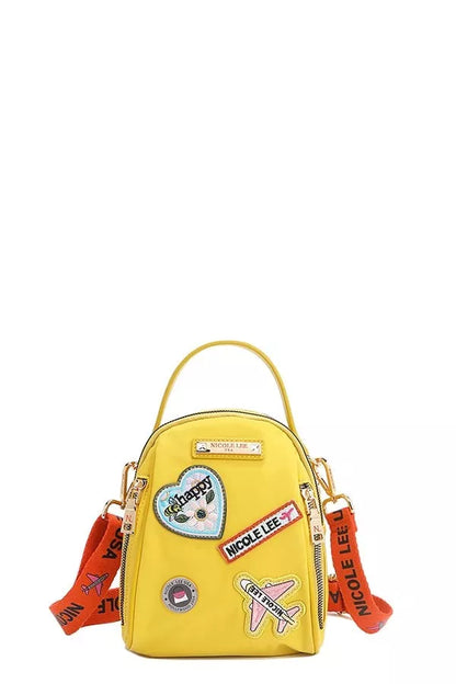 Nicole Lee color patch bag in yellow with fun patches and adjustable straps for a trendy look