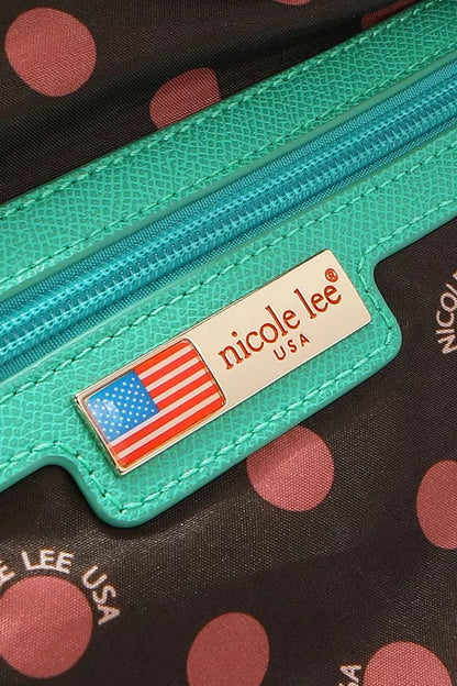 Close-up of Nicole Lee structured tote bag showing vibrant turquoise texture and USA flag detail