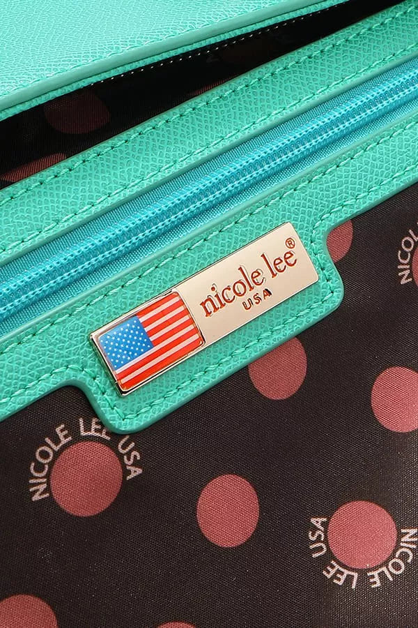 Interior view of Nicole Lee USA monogram handbag featuring a zippered pocket and polka dot lining