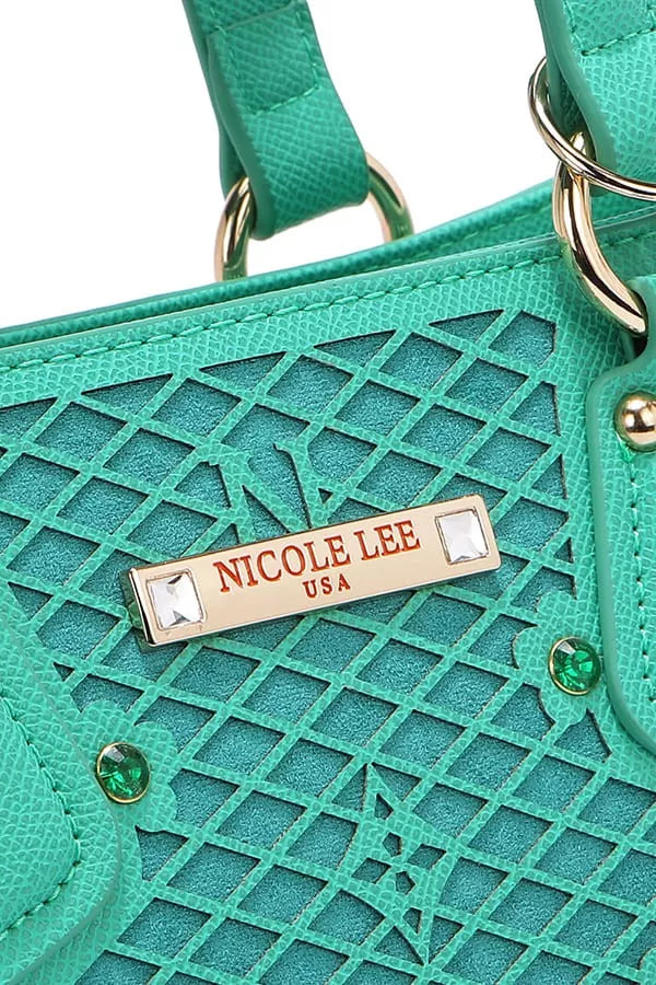 Close-up of Nicole Lee USA monogram handbag showcasing textured green material and logo detail