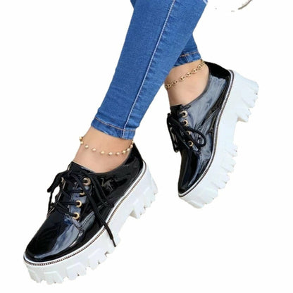 Shophouse Northwest platform oxford shoes for women in black with chunky white sole, stylish and trendy.
