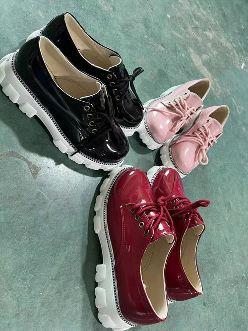 Stylish platform oxford shoes for women in black, pink, and maroon colors with chunky soles