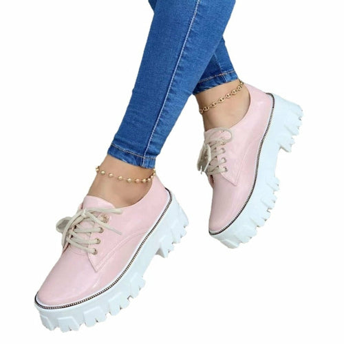 Trendy pink platform oxford shoes for women with chunky white soles for a stylish look