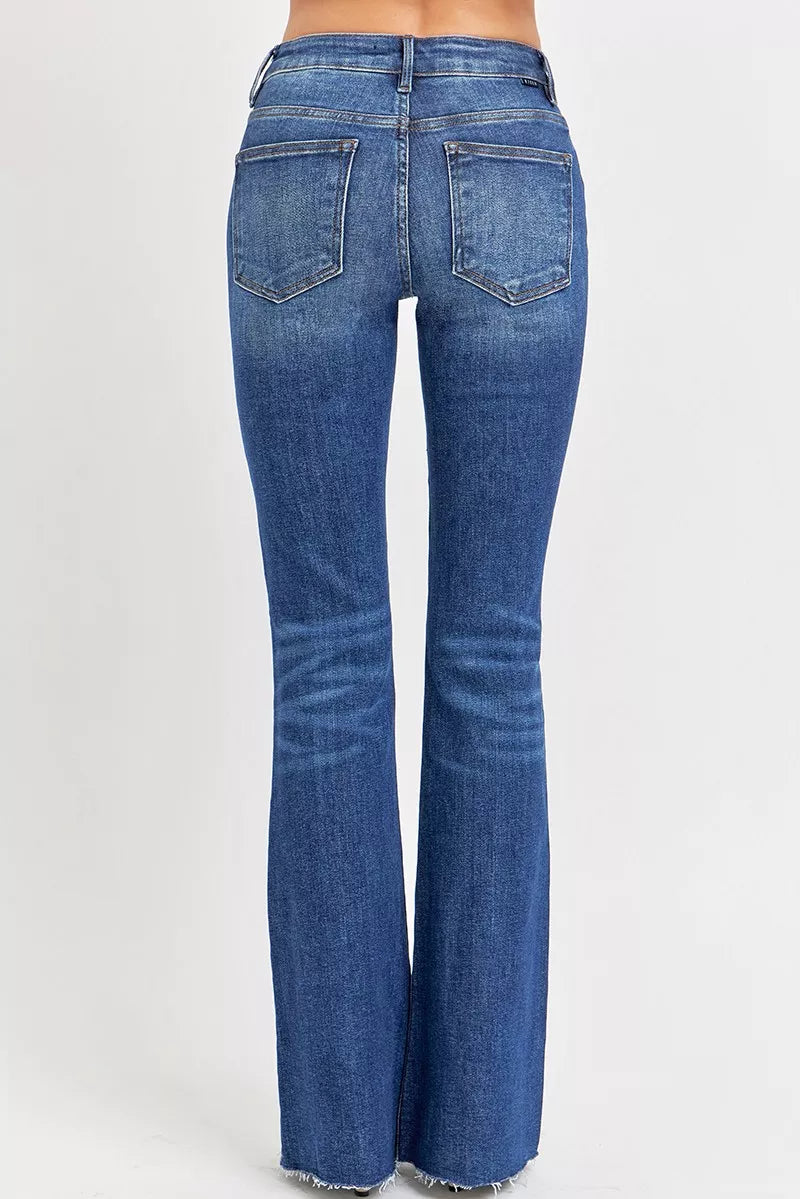 Trendsi plus size distressed flare jeans in blue with a high-rise and a stylish back view