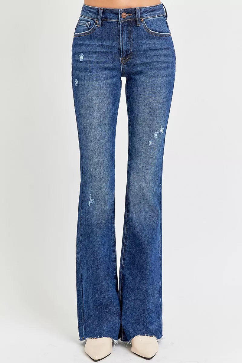 Trendsi plus size distressed flare jeans in dark wash with stylish rips and a flared leg fit